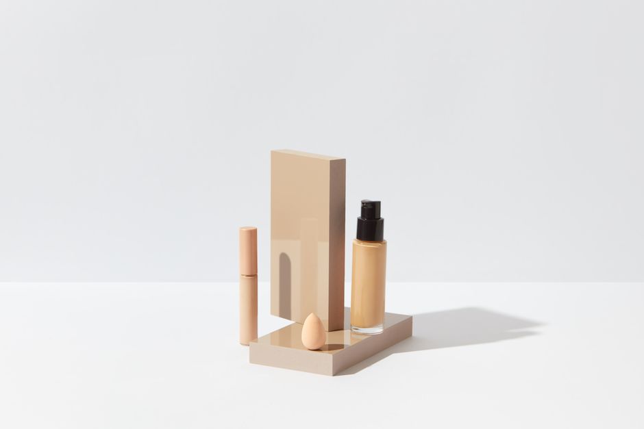 Bounce concealer in with a damp sponge — never wipe or drag