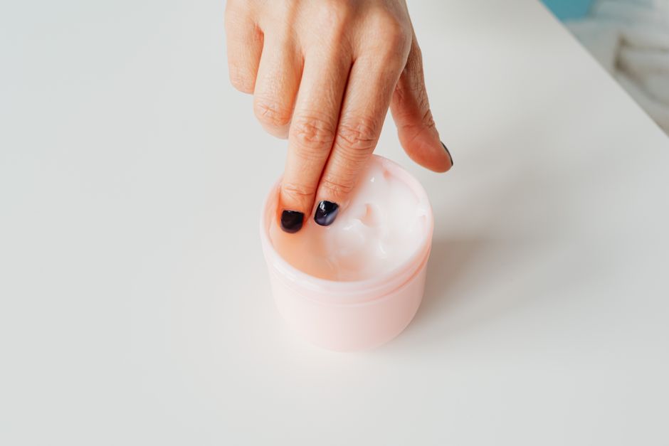 Close-up of a creamy moisturizer texture in an open jar